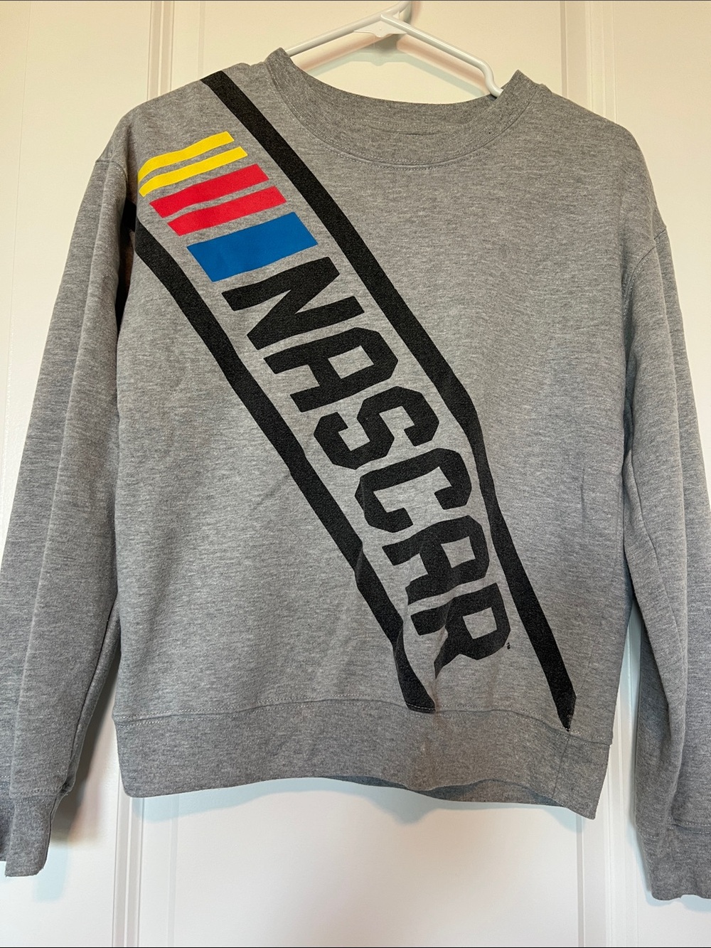 Nascar Gray Crewneck with Black Logo and Yellow-Red-Blue Stripes
